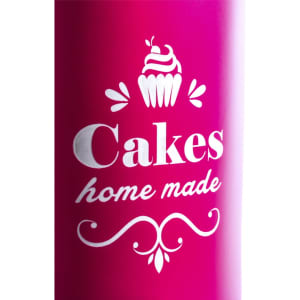 A pink drink bottle featuring a white logo with a cupcake and the words "Cakes home made".