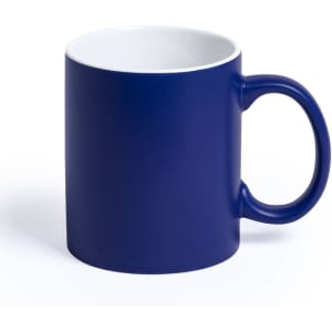 A coffee mug in a deep navy blue with a contrasting white interior and a sturdy handle. Features a logo.