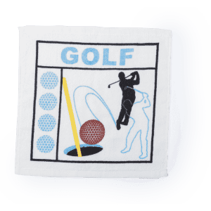 A white golf towel featuring a graphic design with a golfer, golf ball, and hole, along with a logo.