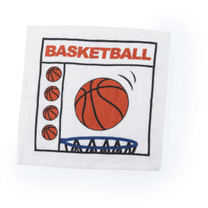 A white towel featuring an embroidered basketball design with orange balls and a hoop. It has a logo.
