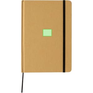 A kraft notepad with a black elastic band and a green square on the front cover. It features a logo.