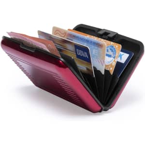 A red card holder with an open design, displaying multiple cards inside. It features a logo on the exterior.