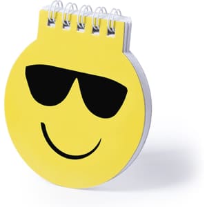 A circular yellow notebook with a smiling face and sunglasses, featuring a wire spiral binding and a logo.