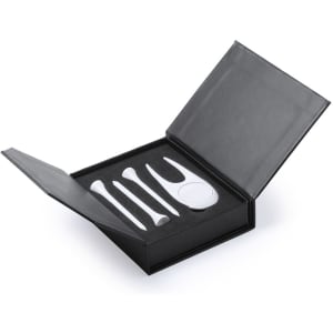 A black box containing a set of white golf tees and a ball marker. The box features a sleek design.