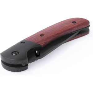 A pocket knife with a wooden handle and a black metal blade, featuring a logo on its surface.