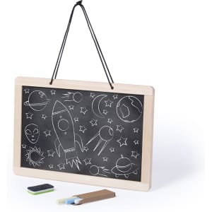 A wooden-framed blackboard with space-themed drawings, accompanied by chalk and an eraser.