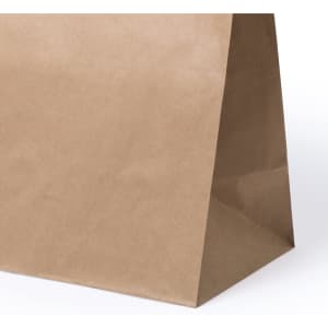 A brown paper bag featuring a simple design and a flat base for stability.