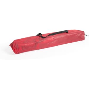 A red carrying bag with a black handle, designed for a portable chair. The bag is elongated and zippered.