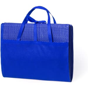 A blue beach mat with a textured surface and handles for easy carrying. It features a large pocket on one side.