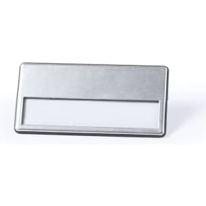 A silver name badge with a clear window for inserting identification. It features a simple, sleek design.