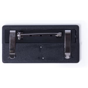 A black ID badge holder with metal clips for attachment and a metal pin on the back.