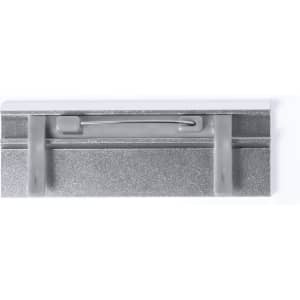 A silver name badge with a pin backing and clear plastic holder for displaying identification.