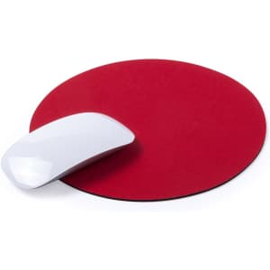 A red circular mousepad with a white computer mouse resting on it, featuring a smooth surface and a simple design.