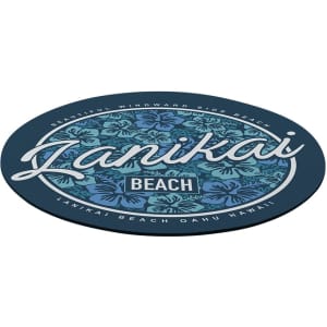 A round mousepad featuring a floral design in shades of blue and green, labelled "Lanikai Beach, Oahu, Hawaii."