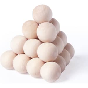 A set of natural wooden balls arranged in a pyramid shape, featuring various sizes and a smooth finish.