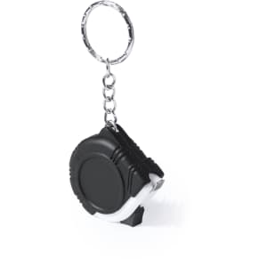 A black and white keyring tape measure, compact in design, featuring a keychain attachment.