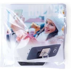 A phone holder with a ring grip, packaged in a clear bag. The holder is black and features a logo.