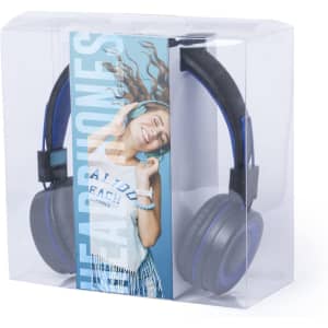 A pair of grey headphones with blue accents in clear packaging, alongside promotional material featuring a model.