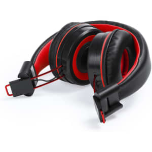 A pair of black headphones with red accents, featuring cushioned ear cups and an adjustable headband.