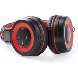 A pair of wireless headphones in black and red with control buttons and a charging port. Logos are visible on the design.