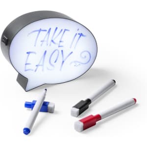 A light-up message board in the shape of a speech bubble, accompanied by four markers in blue, red, black, and grey.