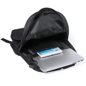 A black backpack with a laptop, tablet, and notebook inside, featuring a mesh pocket and a logo.