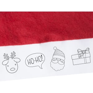 A red Christmas hat featuring a white band with illustrated reindeer, Santa, a gift box, and a speech bubble.