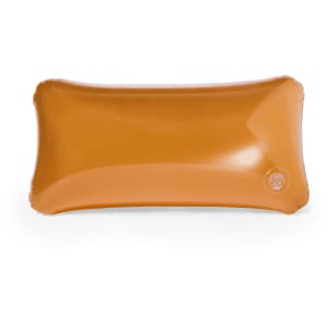 An orange inflatable pillow with a rounded rectangular shape and a logo on one side.