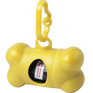 A yellow bone-shaped waste bag dispenser with a clip for easy attachment. It has an opening for bag access.