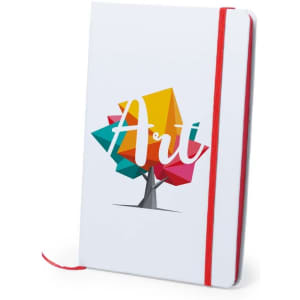 A notepad with a white cover featuring a colourful geometric tree design and a red elastic band closure.