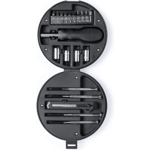 A black circular tool set featuring various sockets, screwdrivers, and a utility knife, all neatly arranged inside.