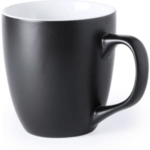 A black coffee mug with a smooth matte finish and a contrasting white interior. It features a sturdy handle.