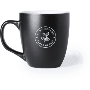 A coffee mug in matte black with a white interior and a circular logo.
