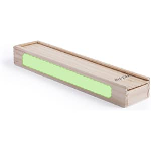 A wooden box with a light green insert, designed for the Mikado Skill Game, featuring a branding logo.