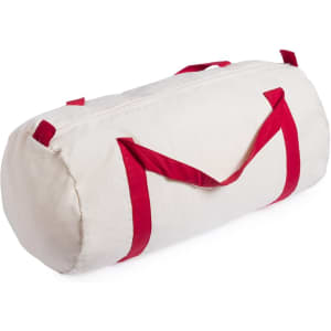 A cream tote bag with red handles, featuring a rounded shape and a simple design. It has a logo.