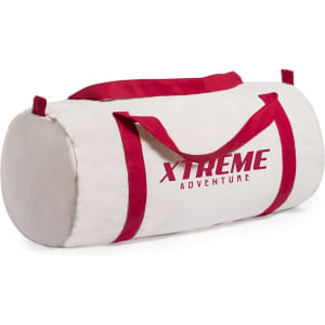 A cream and red duffel bag with two red handles and a logo, featuring a cylindrical shape.