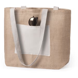 A natural beige tote bag with a white pocket and grey straps, featuring a pair of sunglasses on top.