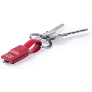 A red charging cable connected to a keyring alongside silver keys. The cable has a USB connector.