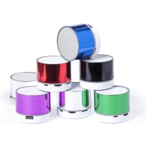 A collection of colourful portable speakers in blue, red, silver, green, black, and purple stacked together, featuring a logo.