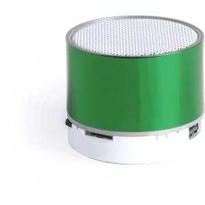 A round green speaker with a silver grille on top, featuring a white base and a logo.