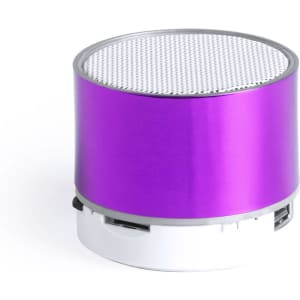 A round portable speaker in vibrant purple with a metallic finish and a gridded speaker mesh on top.