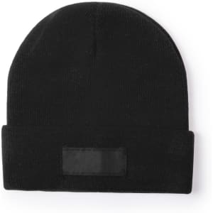 A black beanie hat featuring a folded cuff and a logo patch on the front.