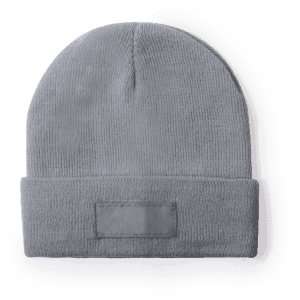 A grey beanie hat featuring a fold-over cuff and a blank patch for branding.