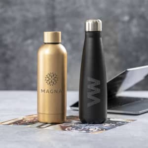 A drink bottle in gold on the left and a black drink bottle on the right, both featuring logos.