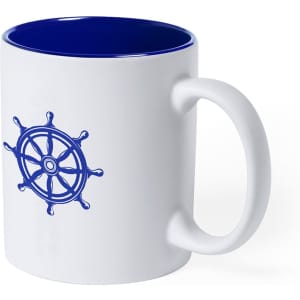 A coffee mug featuring a blue interior and a nautical wheel design on a white exterior, along with a handle.