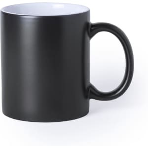 A black coffee mug with a contrasting white interior and a curved handle. Features a logo on the surface.