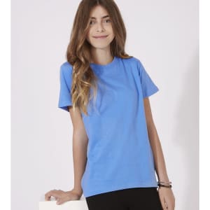 A blue Kids Colour T-Shirt with short sleeves, displayed by a model with long, wavy hair. The shirt features a logo.