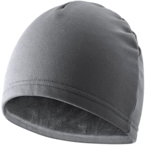 A grey beanie with a smooth finish and a soft interior lining. It features a logo on the exterior.