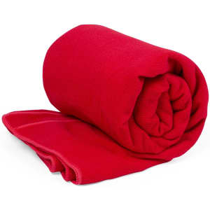A rolled red absorbent towel designed for leisure and outdoor activities. It features a soft fabric and neat stitching.
