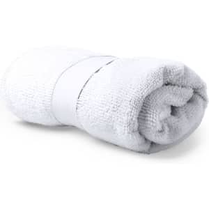 A rolled up white absorbent towel, featuring a band to keep it secured. Ideal for outdoor leisure activities.